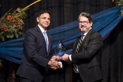 Piyush Sabharwall accepts award
