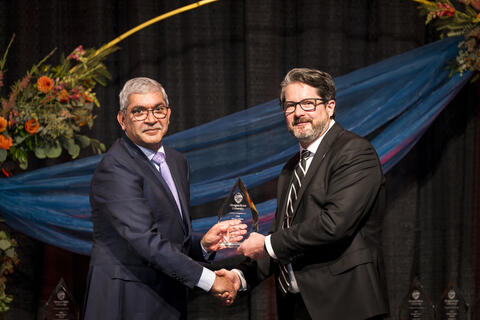 Rajeev Badyal accepts award