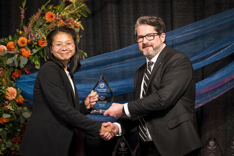 Tianna Coburn accepts award