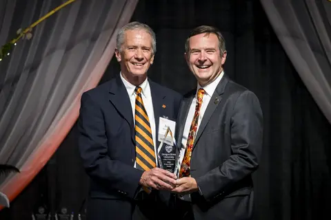 Bradley Hermanson recieving award from Scott Ashford.