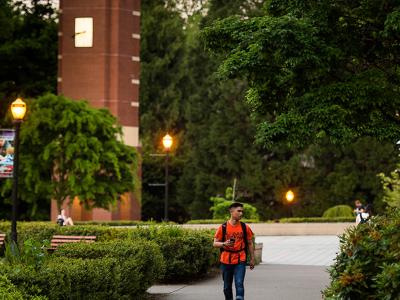 Student walking Oregon State.