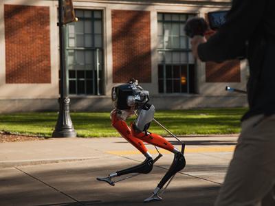 A two-leg robot walking around the Oregon State University campus.