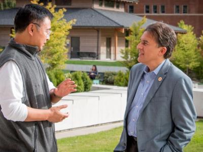 Oregon State Nuclear Engineering Professors Qiao Wu (left) and Jose Reyes discuss NuScale Power's ongoing research at Oregon State.