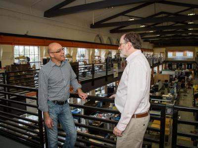 Two faculties having a conversation