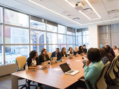 A group of people in a meeting.