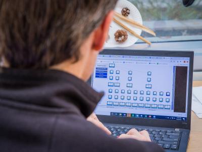 professor using his laptop