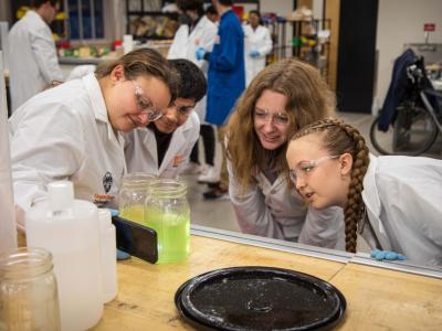 Group of engineering students in lab uniform