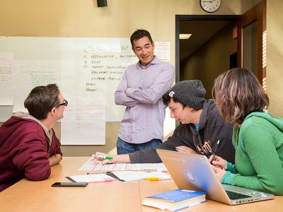A group of students in a classroom. 