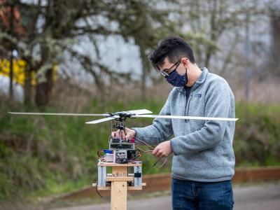 A person holding a drone